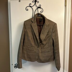 Brown plaid suit coat with skirt.